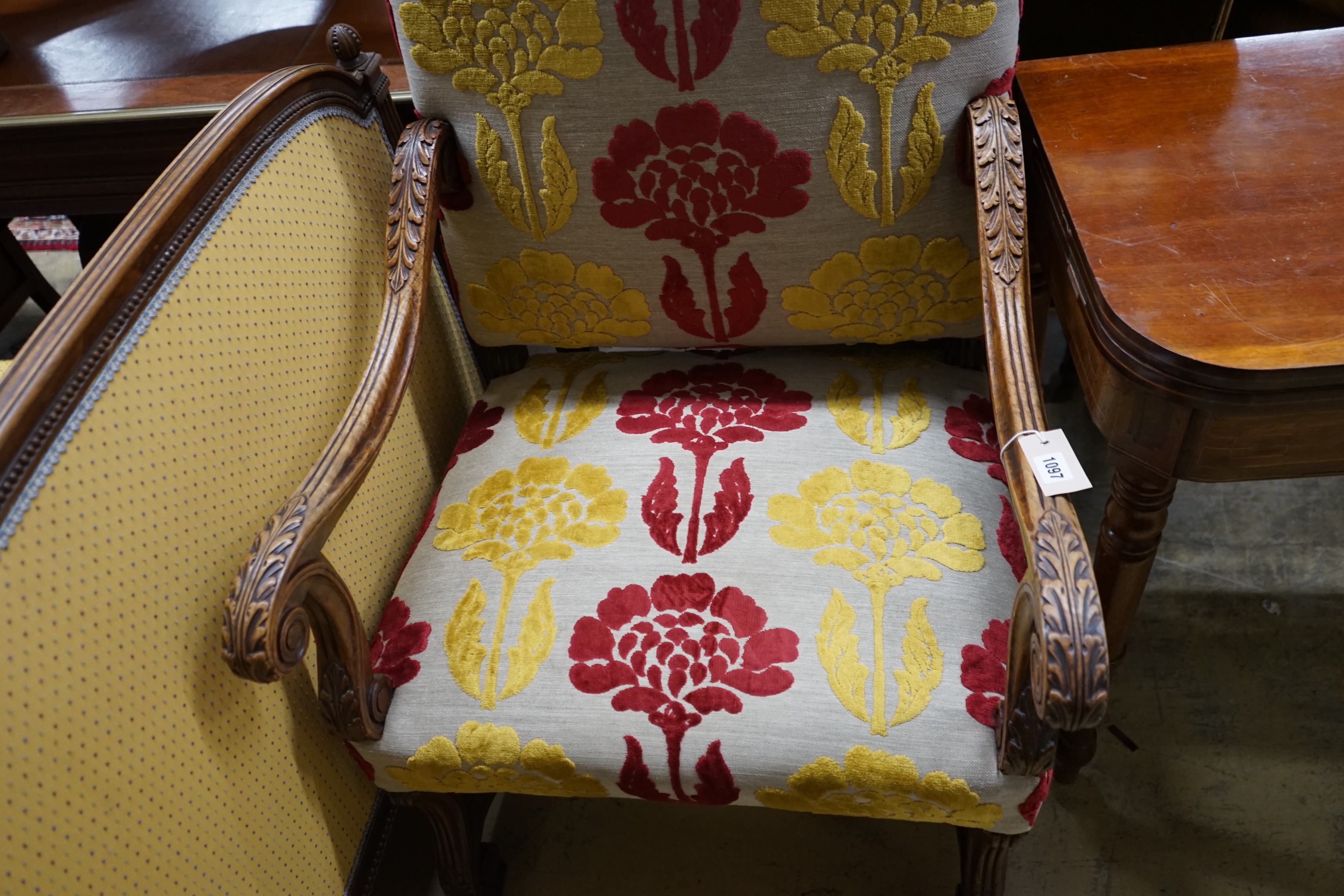 An upholstered Carolean style armchair, width 65cm, depth 56cm, height 114cm